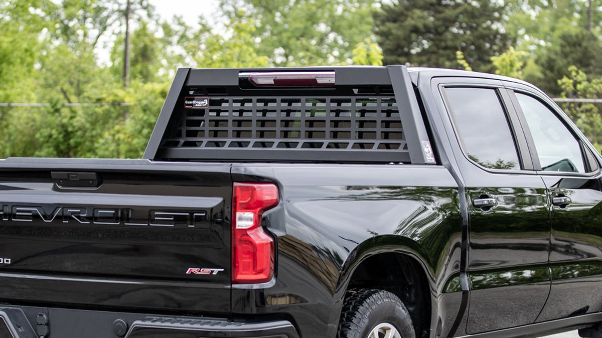 Buyers GuardDogg headache rack on a black pickup truck