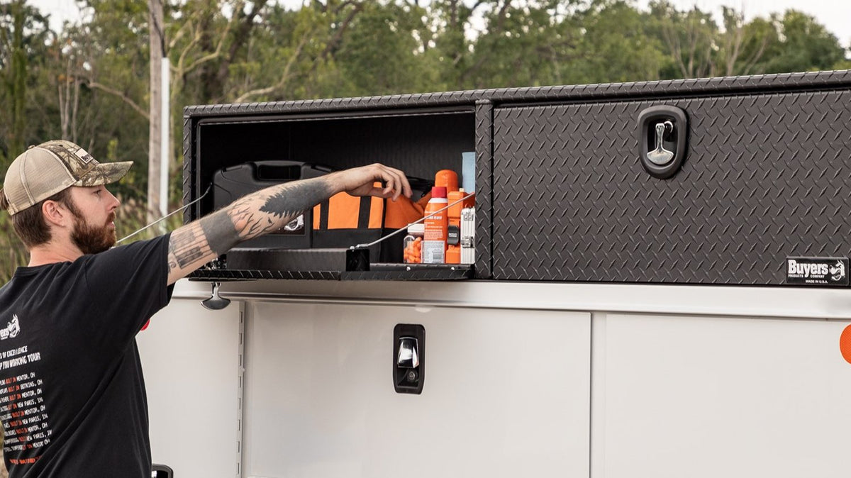 Buyers Products black diamond tread topsider truck box on a service body